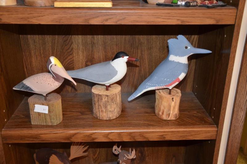 lot 35 image: Three hand carved birds, Brown pelican, Commo...