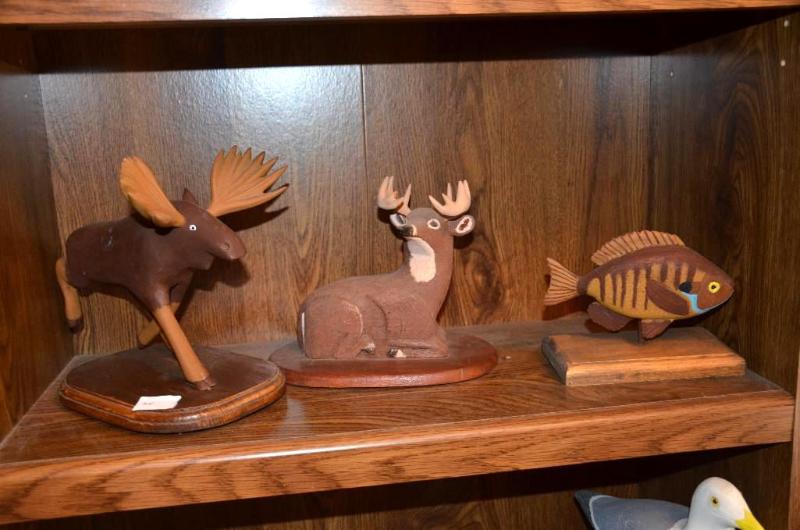 lot 36 image: Hand carved moose, fish , deer. Hand made by ...