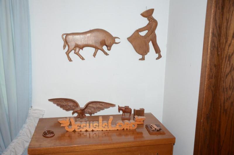 lot 44 image: Wood carvings from Ecuador - bull, gladiator,...
