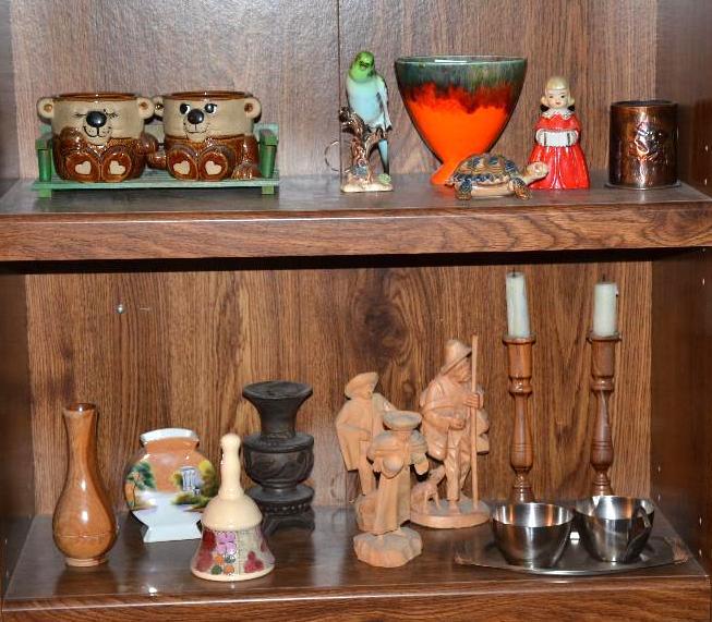 lot 45 image: 2 shelves of pottery & wood carvings made...