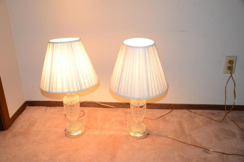 lot 55 image: Two crystal glass lamps 22" tall...