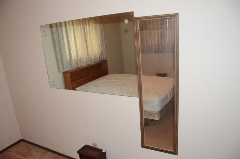 lot 56 image: two wall mirrors, bring tools to remove....