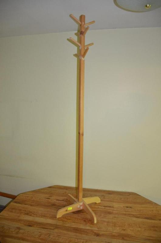 lot 73 image: Wood coat tree 67" tall...
