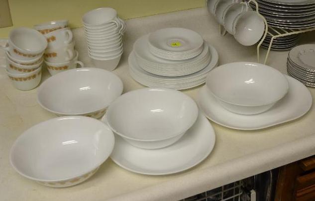 lot 77 image: Corelle dish set.  The majority is white...