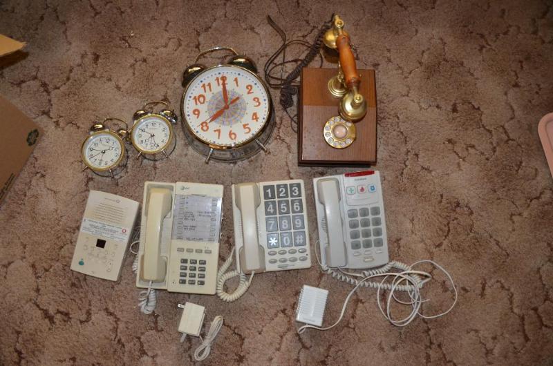 lot 90 image: Phones and clocks - 9" diameter clock, 2...