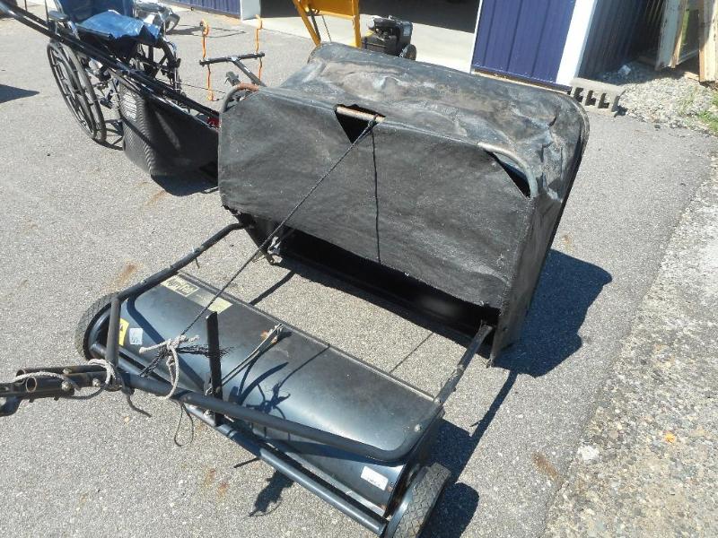 Lawn tractor leaf attachment