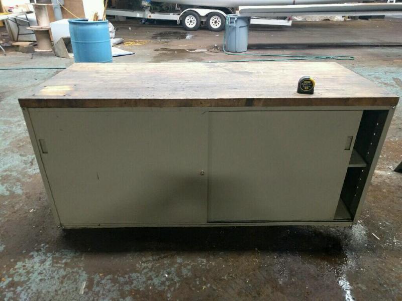 lot 12 image: Butcher Block work table with cabinets and sh...