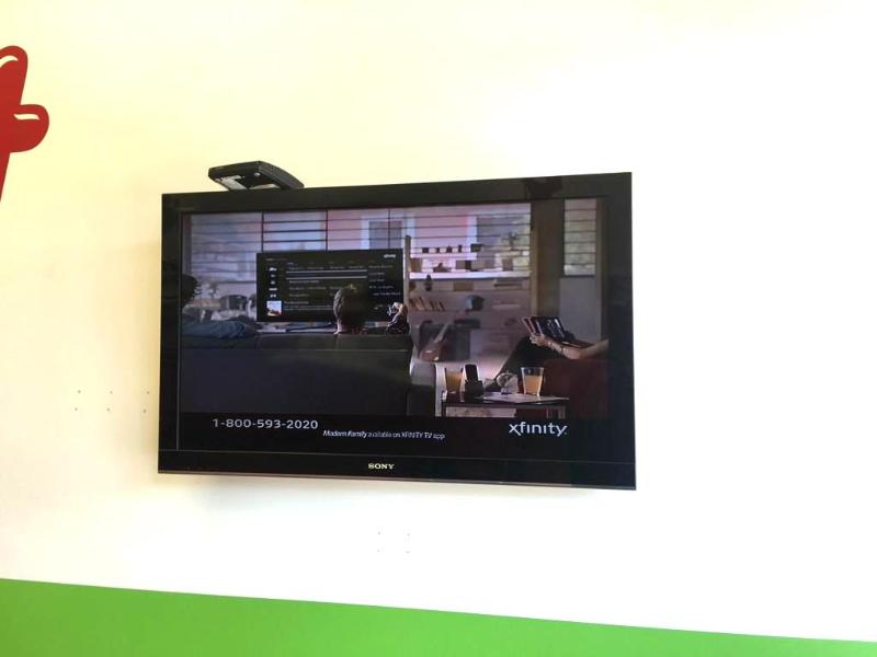 lot 303 image: Sony Bravia wall mounted 40" TV(model KD...