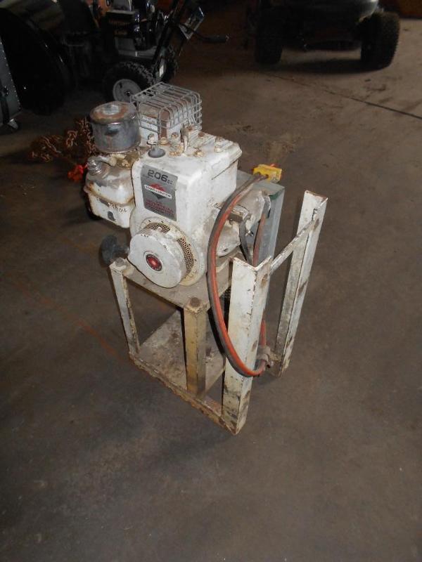 lot 13 image: Portable Gas Golf Cart Charger RARE