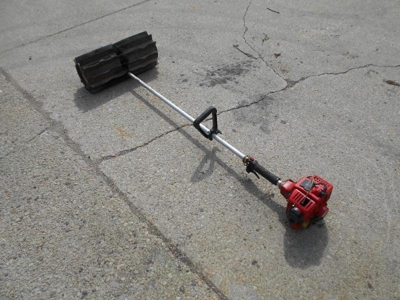 lot 18 image: Shindaiwa Gas Powered Snow  Dirt Broom