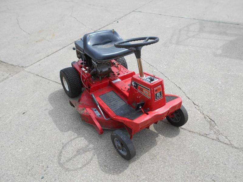 lot 25 image: 30 Riding Lawn Mower with 8HP Gas Motor.