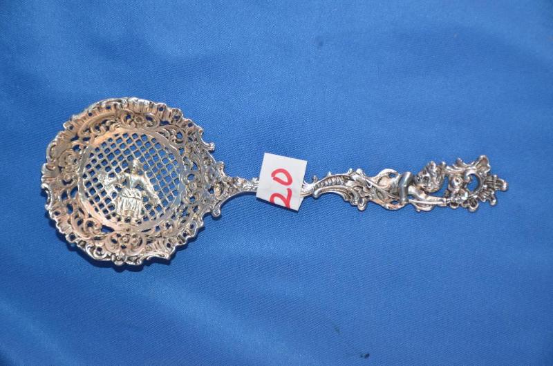 lot 20 image: Antique Sterling silver straining spoon. Orna...