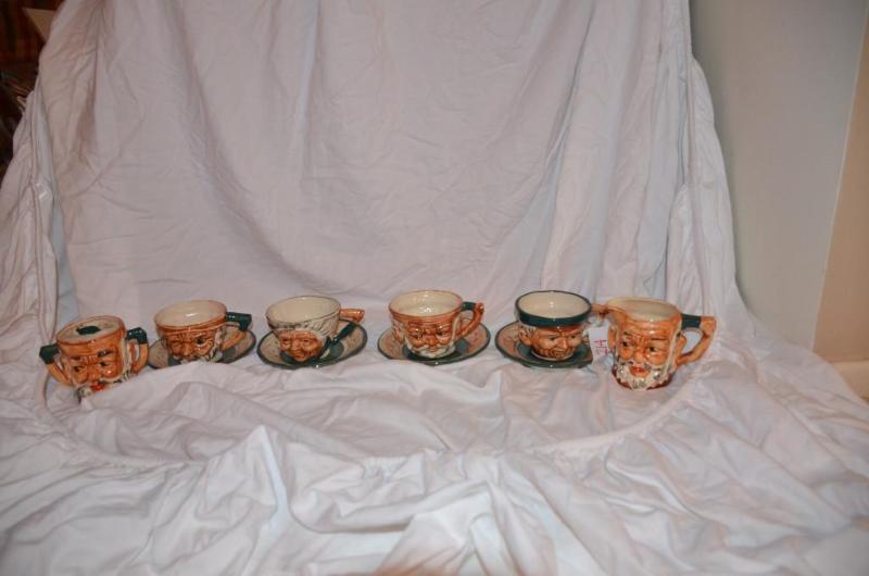 lot 214 image: Unique set of 4 coffee cups and creamer  sug...