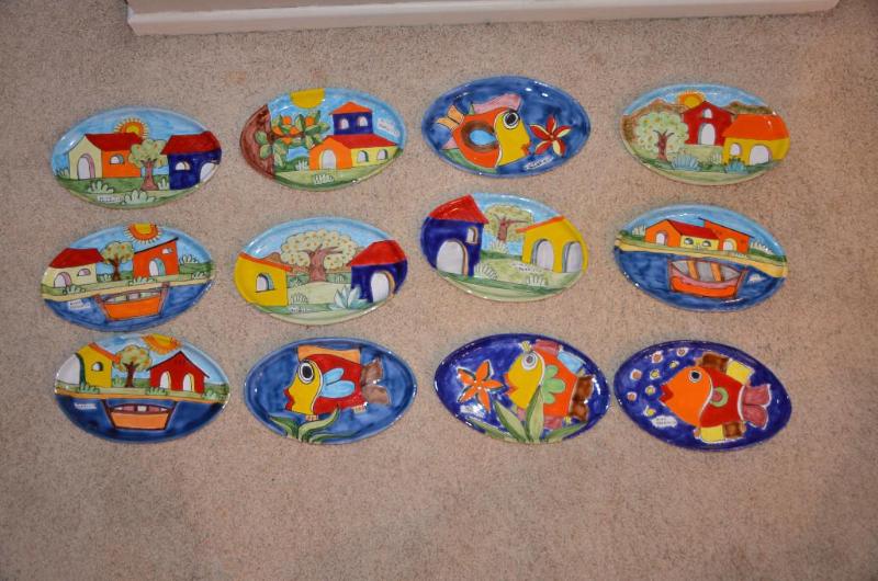 lot 215 image: 12 Nino Parrucca signed 9" oval plates...