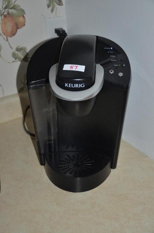 lot 57 image: Keurig coffee maker.  Powers up....