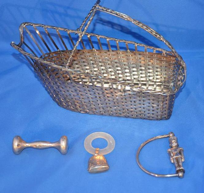 lot 67 image: Antique baby bottle holder basket made of met...