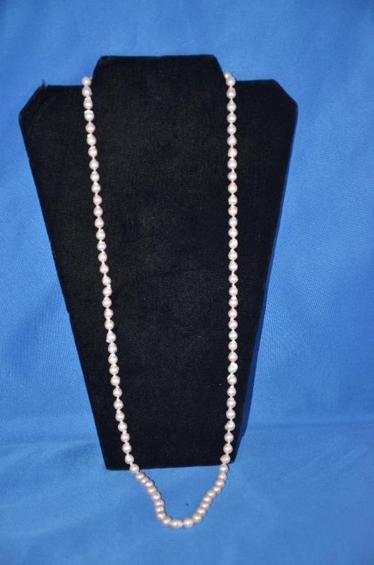 lot 75 image: 14k gold clasp and pearl necklace...