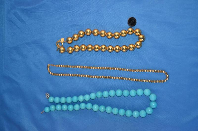 lot 89 image: 3 necklaces, one is Anne Klein , Movado M125...