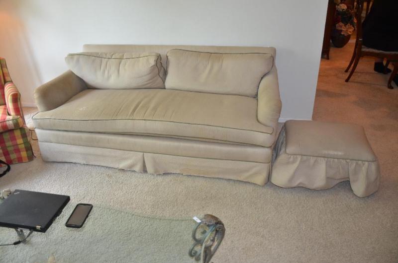 lot 9 image: Sofa with ottoman. 77" long Please bring...