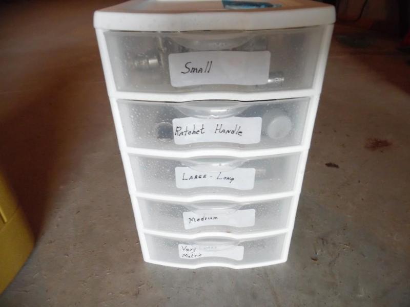 Storage container with sockets