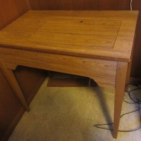 lot 100 image: Sewing Machine Table
