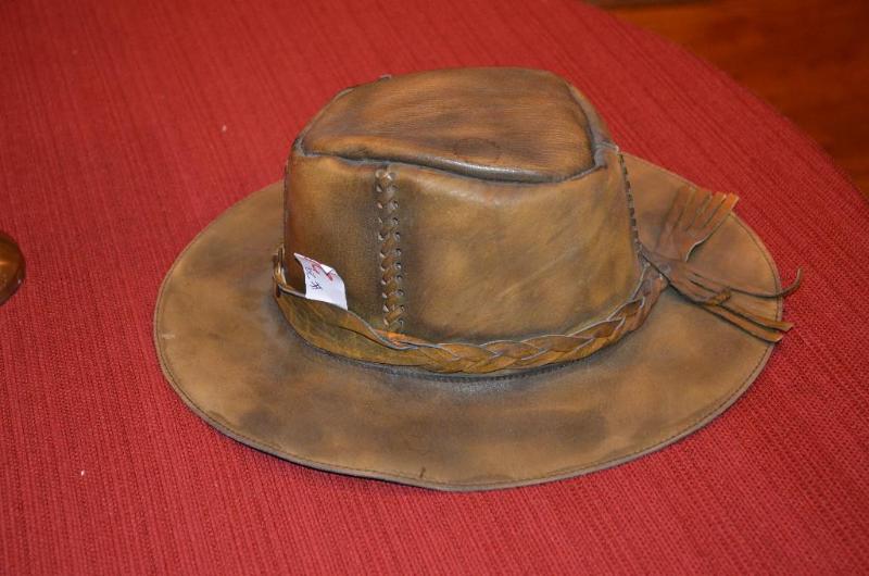 lot 29 image: Leather hat...
