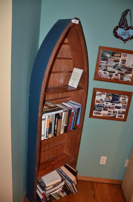 lot 36 image: Boat bookshelf 72" tall & 22" w...