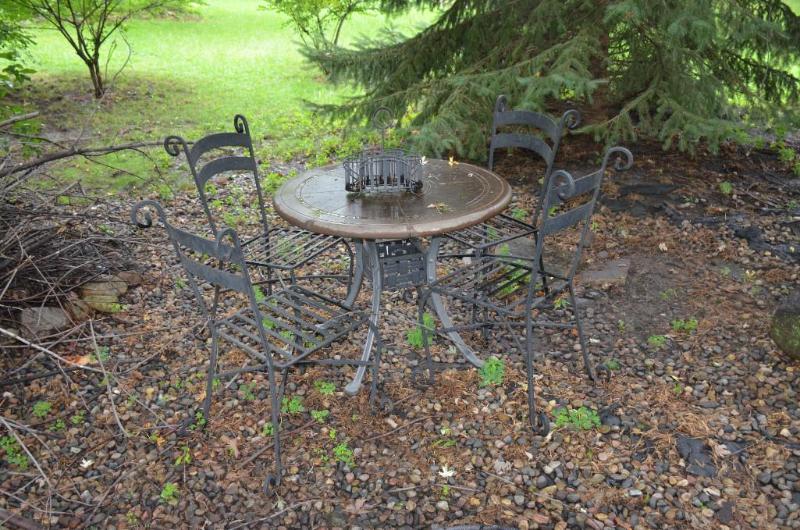 lot 64 image: Patio table & 4 chairs. Table is 36"...