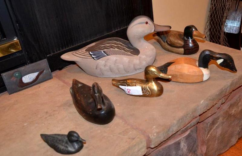 lot 8 image: Group of small and large duck decoyscarvings...