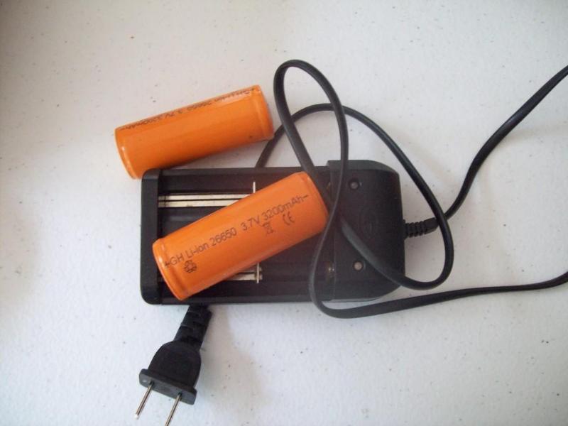 lot 39 image: Lithium-ion 26650 Rechargeable Batteries and Charger Kit