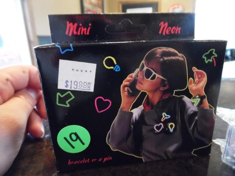 lot 19 image: Neon Bracelet and Toy Car