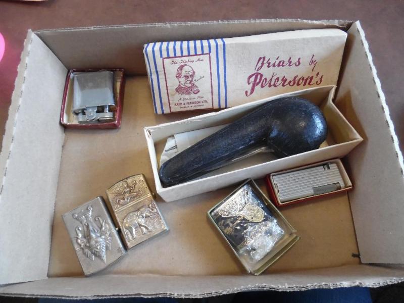 lot 58 image: Vintage lighters and vintage pipe