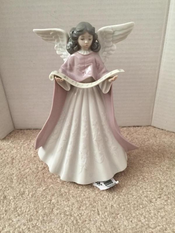 lot 149 image: Lladro Pink Robe Christmas Angel Topper. 1999...