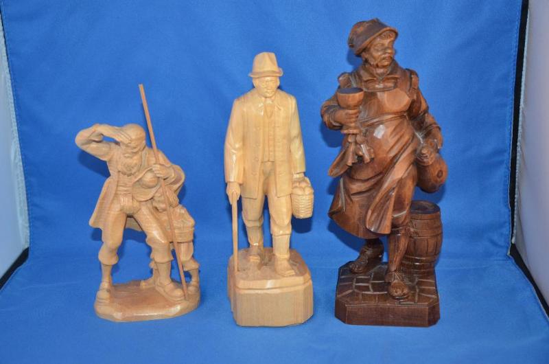 lot 217 image: 3 wood carved figures. Tallest reads Western ...