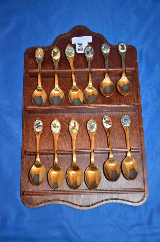 lot 46 image: Franklin Mint Collector Spoons - gold colored...