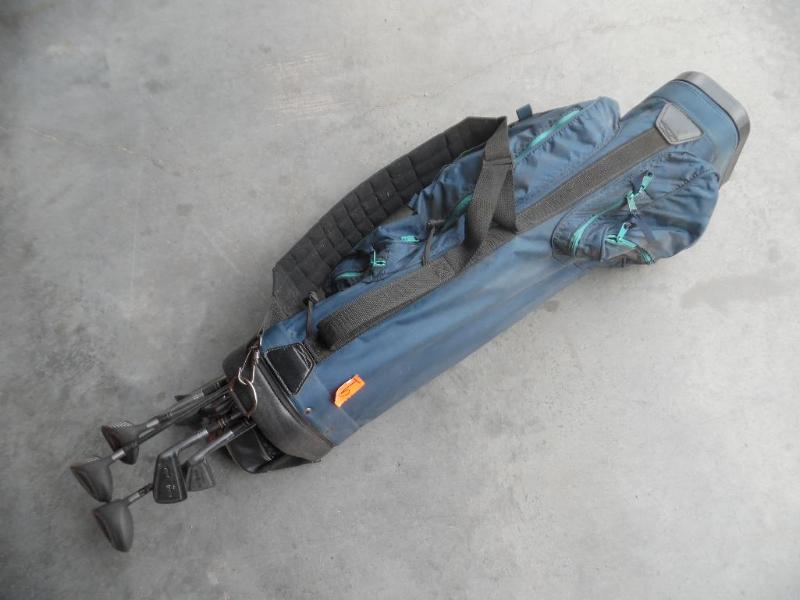 lot 9 image: Arnold Palmer golf clubs and bag