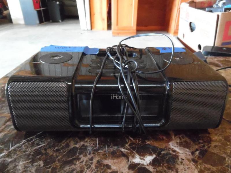lot 11 image: I Home Alarm Clock and I Pod Dock