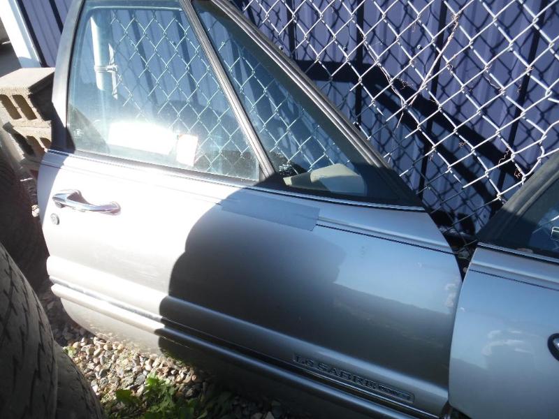 lot 7 image: Buick LeSabre Car Door