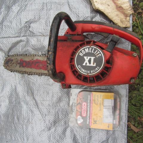 lot 192 image: Homelite XL Chainsaw