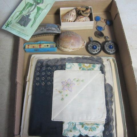 lot 211 image: Hankies, Harmonica, Expo Shell