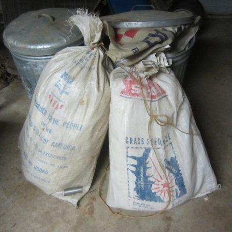 lot 312 image: Gunny Sacks, Galvanized Cans