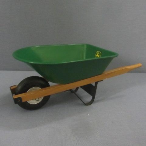 lot 17 image: John Deere Toy Wheelbarrow