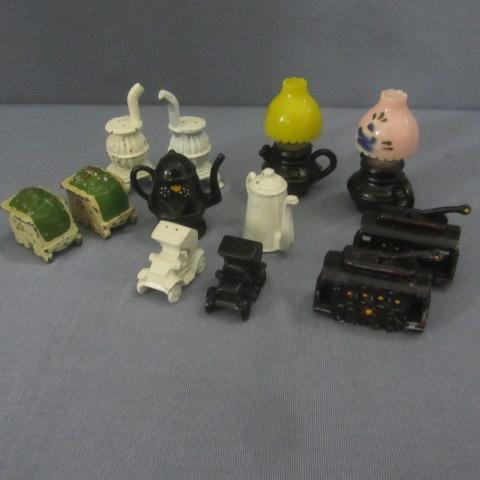 lot 334 image: Cast Iron Shakers