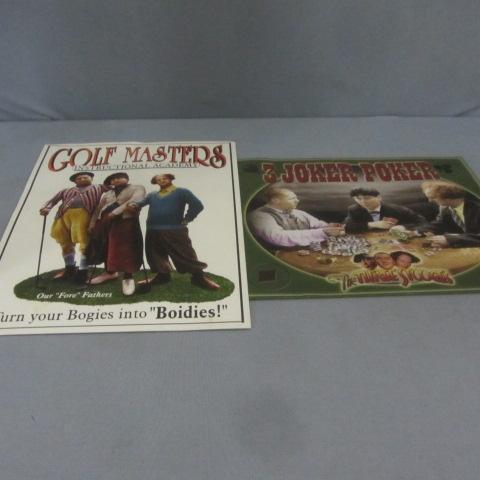 lot 38 image: Three Stooges Tin Signs