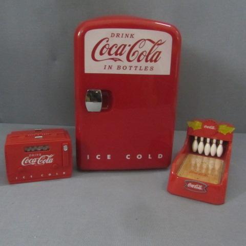 lot 89 image: Coke Mini Fridge, Bank, Radio