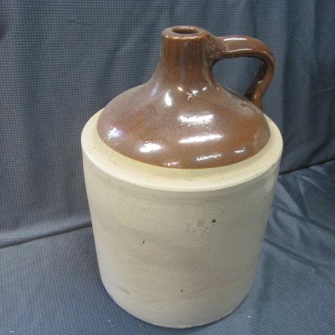 lot 65 image: Brown Top 2 Gallon Jug