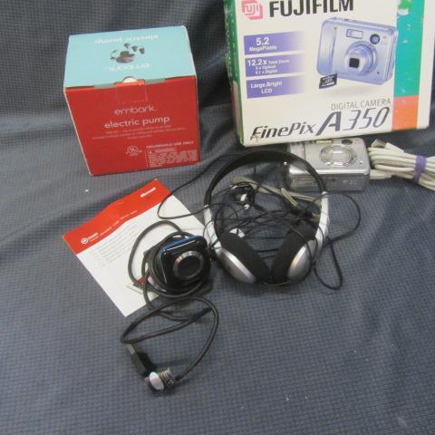 lot 99 image: Web Cam, Pump, Head Phones