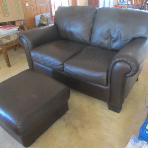 lot 15 image: Brazilian Leather Loveseat & Ottoman