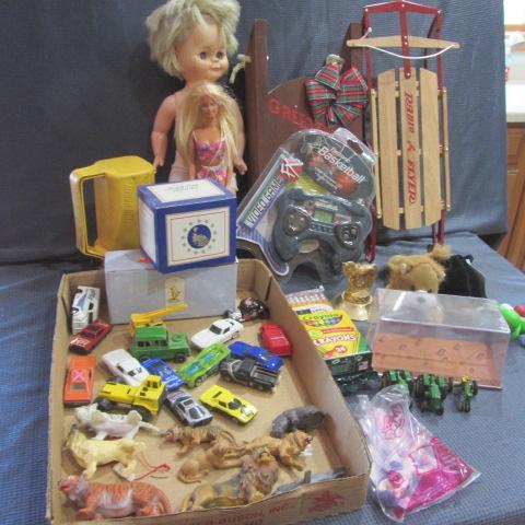 lot 448 image: Sled, Barbie, Car & Tractors