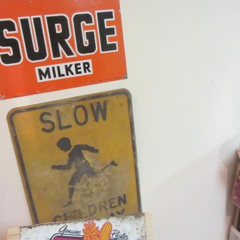 lot 540 image: Surge, Slow Children & Seed Signs